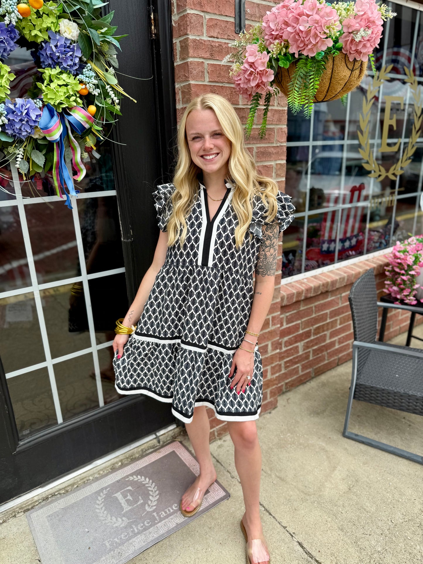 Black Ruffle Baroque Pattern Tiered Dress, available in sizes XS-XL. Features ruffle accents and a tiered silhouette.