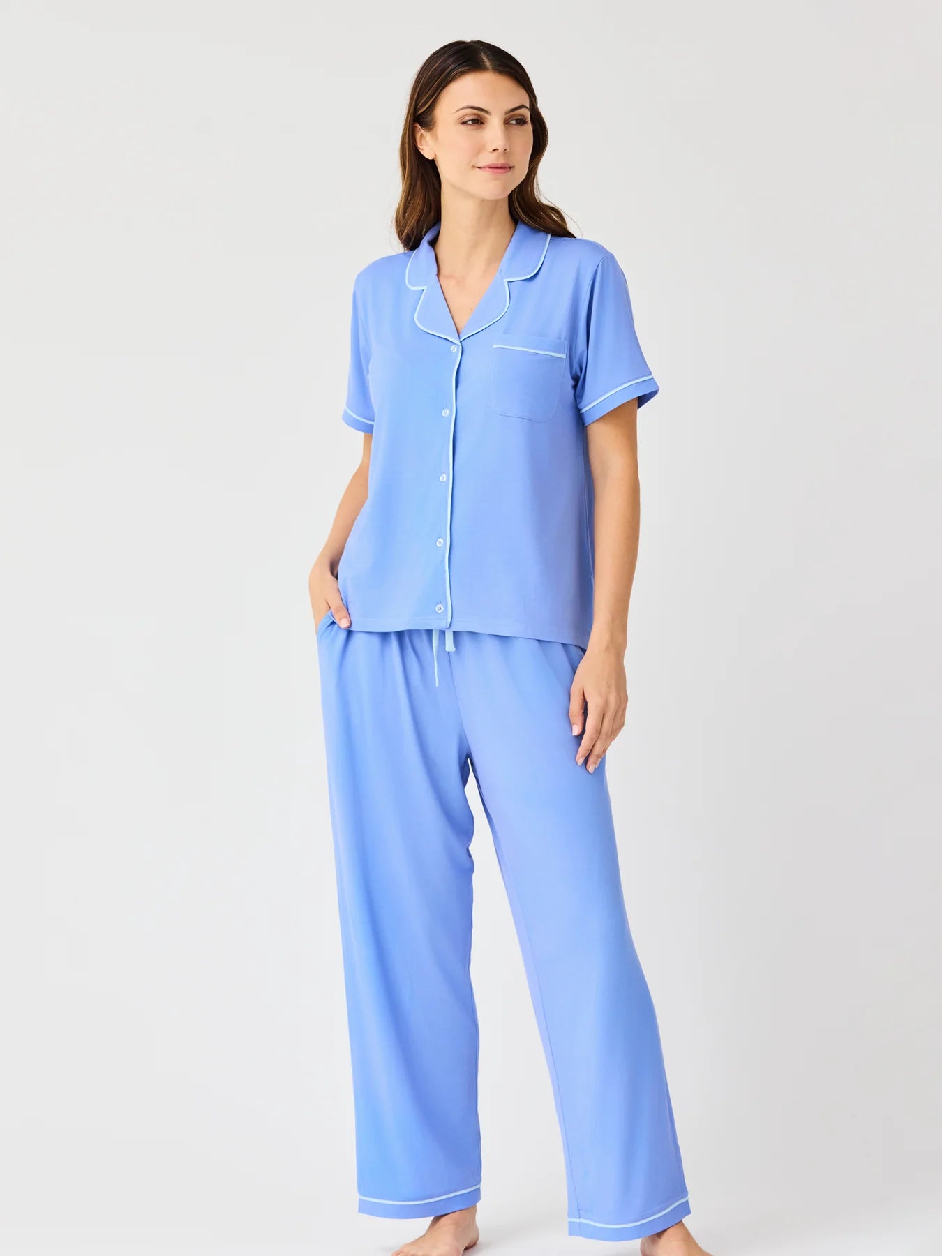 Charlotte Blue Pants Set: light blue pajamas with white piping, short-sleeve button-up shirt, loose pants. Sizes XS–XL.