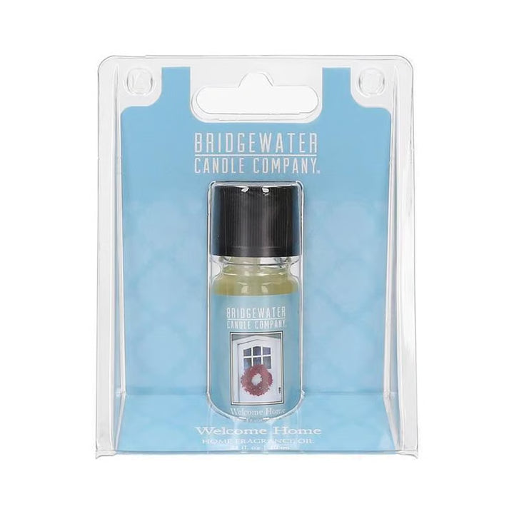 Welcome Home Fragrance Oil in a small bottle and clear plastic retail packaging.