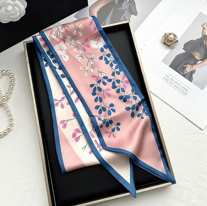 Pink silk scarf with blue and white floral and leaf patterns, silky feel. Available sizes: S, M, L.
