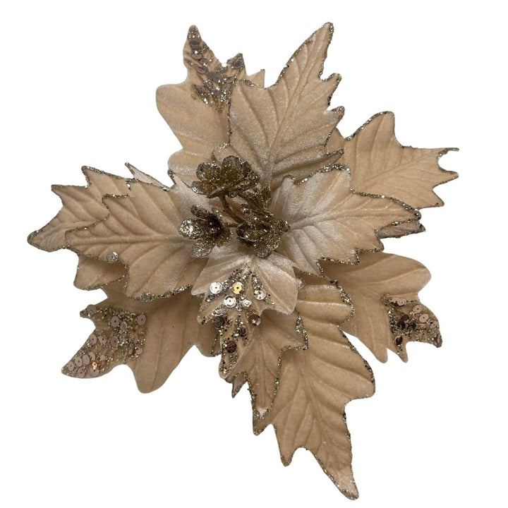Beige velvet poinsettia with layered petals, champagne glitter edges, and sequins; available in 12″ diameter.
