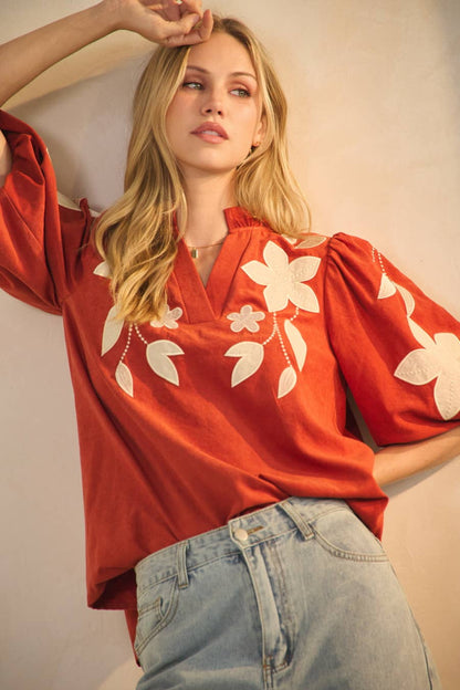 Loose, camel-colored washed suede top shown in size small; available in multiple sizes.
