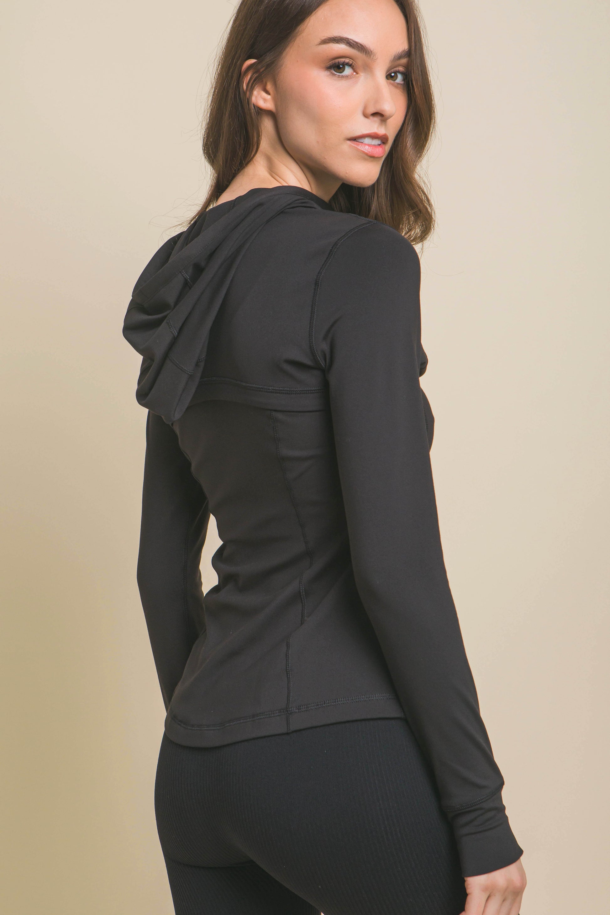 Solid Knit Performance Activewear Jacket in black. Available sizes: XS, S, M, L, XL.