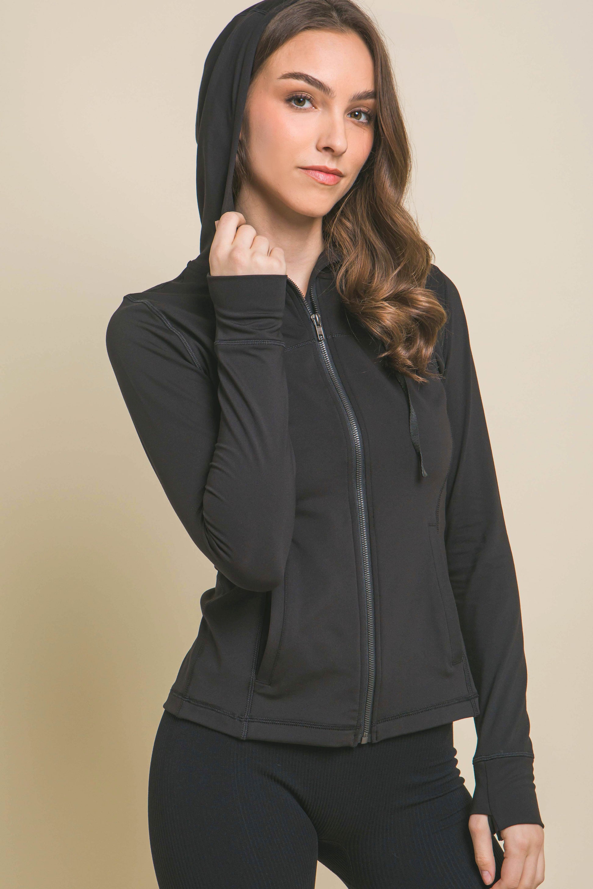 Solid Knit Performance Activewear Jacket: Black color, features a hood. Sizes available: XS, S, M, L, XL.