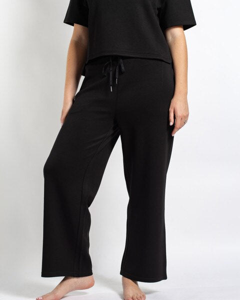 Black Taylor Pants, relaxed wide-leg fit with drawstring waistband, available in all sizes.