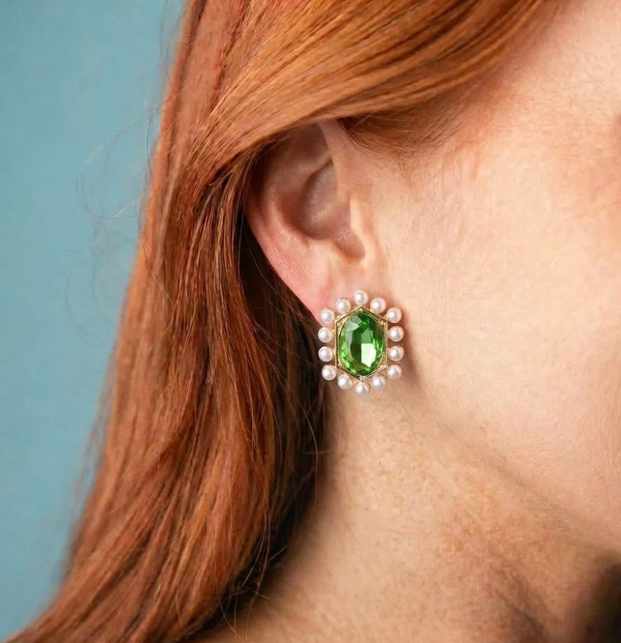 Green Oval Pearled Stud Earrings with a large oval green gemstone bordered by small white pearls. Available in small, medium, and large sizes.