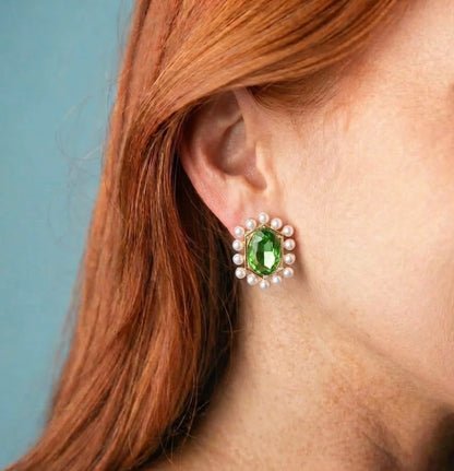 Green Oval Pearled Stud Earrings with a large oval green gemstone bordered by small white pearls. Available in small, medium, and large sizes.