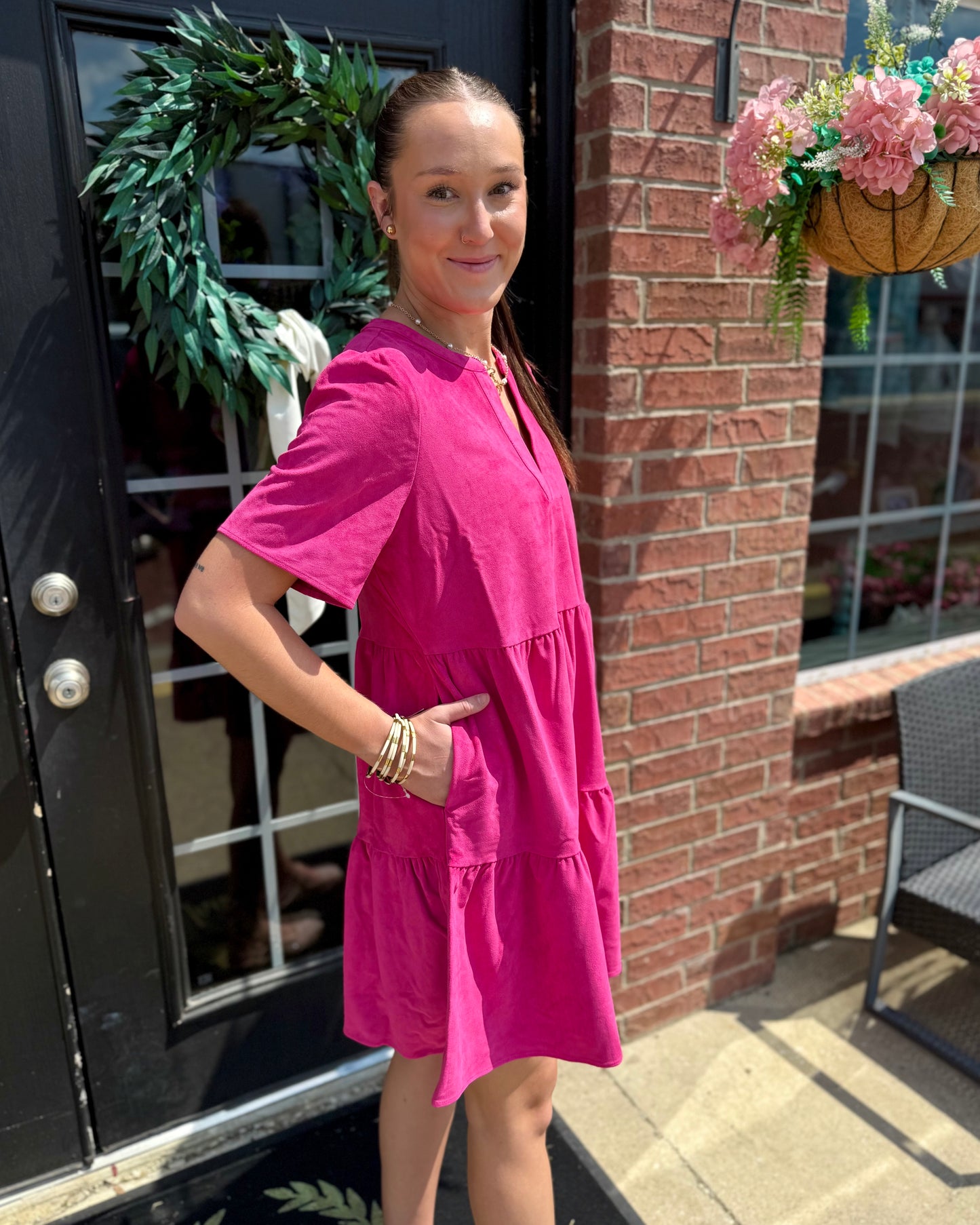 The Adelyn Pink Dress features a feminine style and is available in sizes XS–XL.