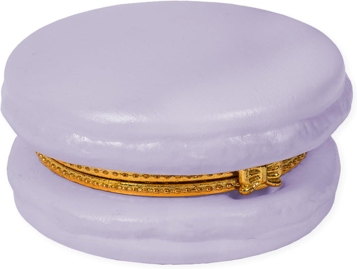 A lilac-colored ceramic Macaron Limoge trinket box featuring a golden clasp shaped like a sparkling belt. Available in one size.