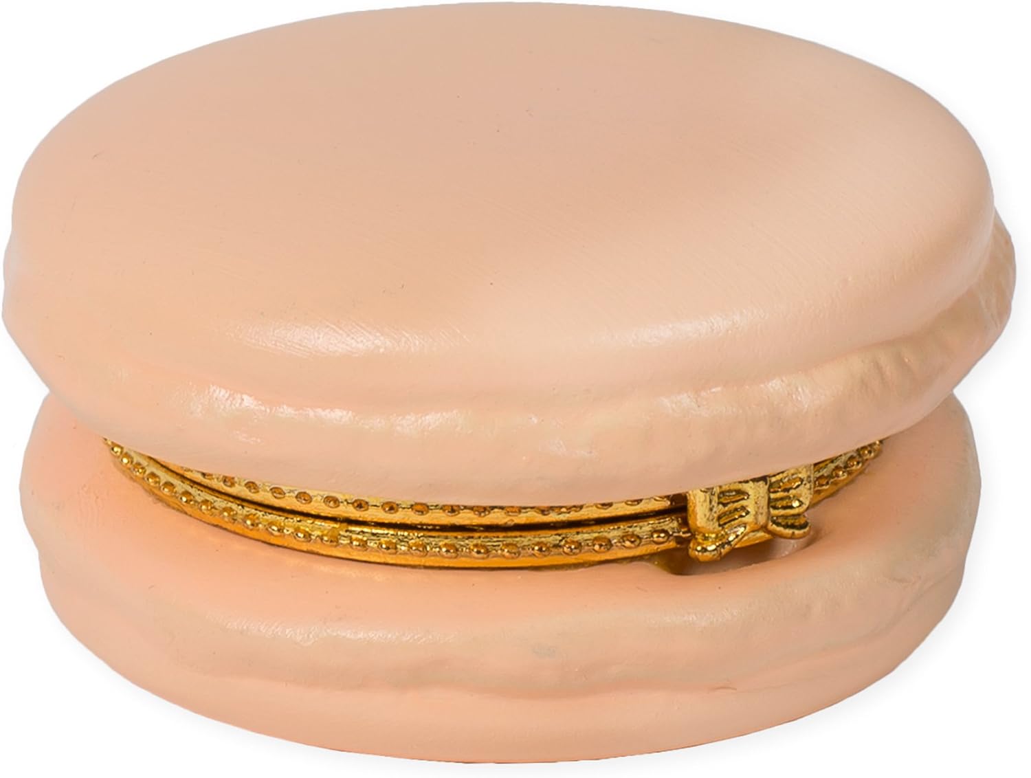 This is a colorful ceramic Macaron Limoge trinket box with a soft peach tone. It features a detailed golden clasp designed to resemble a zipper around its circumference. Available in one standard size.