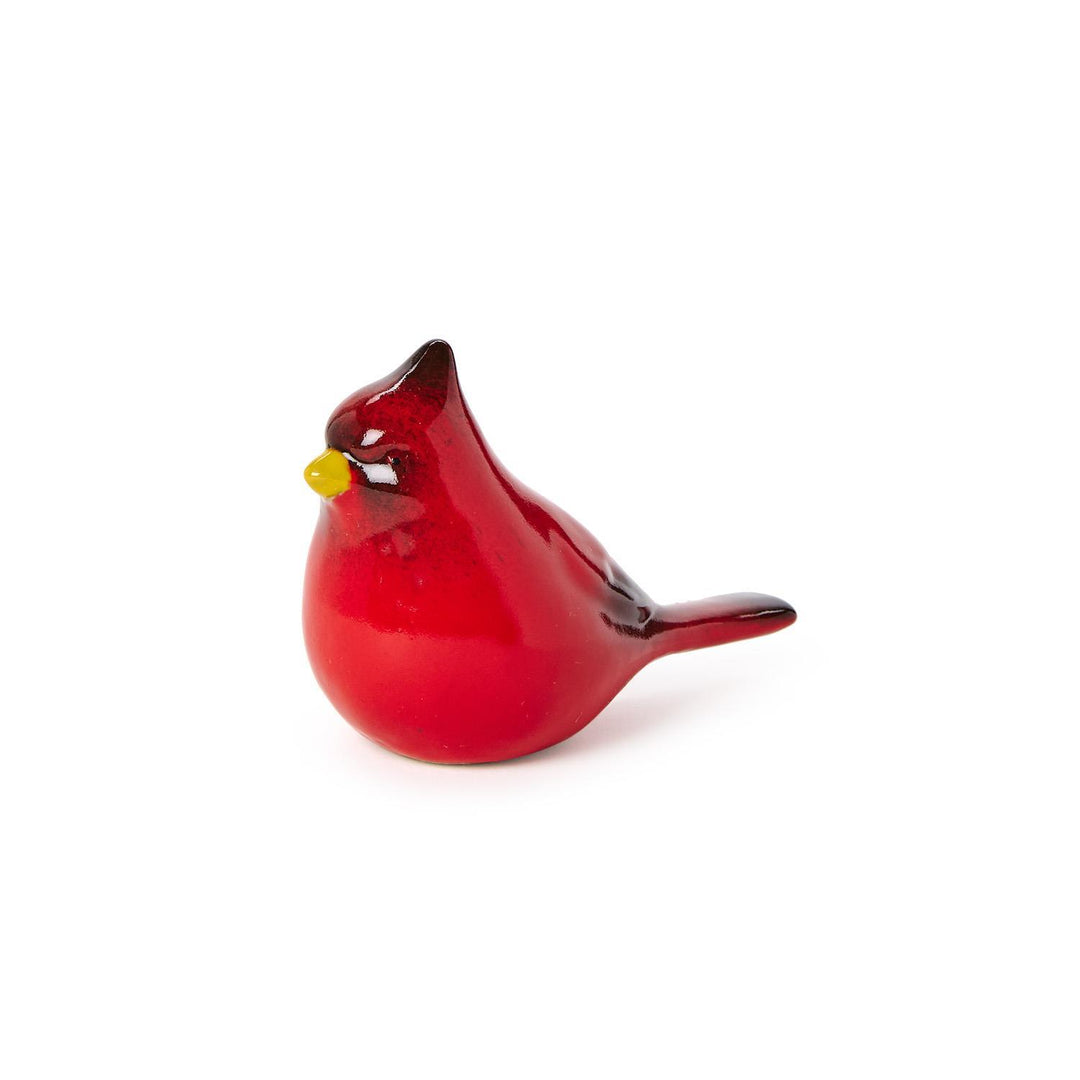Hand-painted cardinal sculpture with a red figurine, yellow beak, and dark crest.