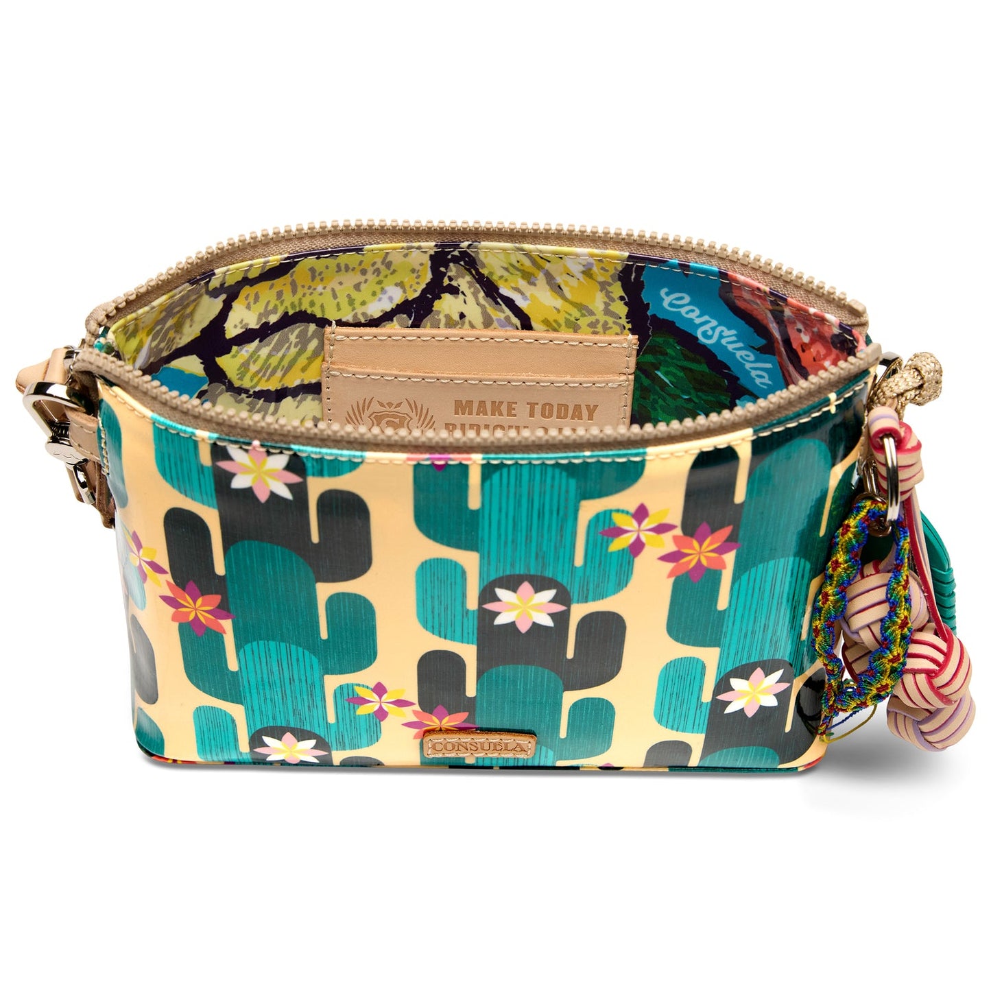Zippered pouch with colorful cactus and floral design, handy keychain, vibrant ConsuelaCloth™ interior, and signature leather label. Available sizes: Small, Medium.
