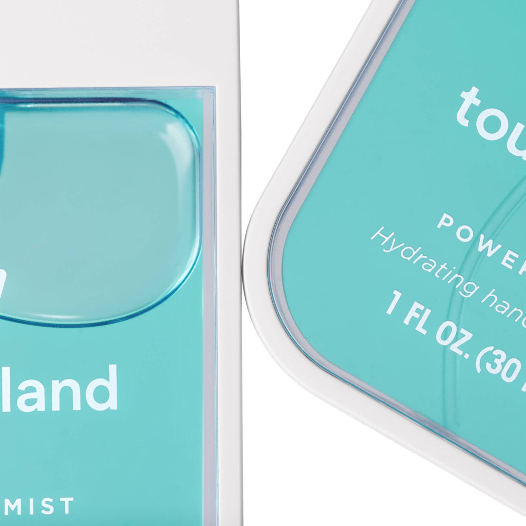 Two 1 fl oz (30 ml) containers of Blue Sandalwood Power Mist Hydrating Hand Sanitizer.