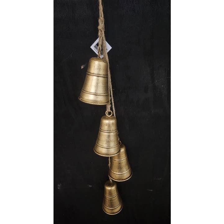 Gold Timeworn Tinkle Bells Bunch features four golden metal bells of varying sizes hanging vertically on thick twine; available in 30 inches.