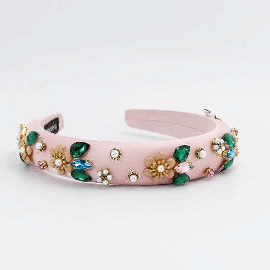 Pink, padded Flower Fantasy Headband with colorful gems and floral beads in green, blue, beige, and white. Sizes: S/M/L.