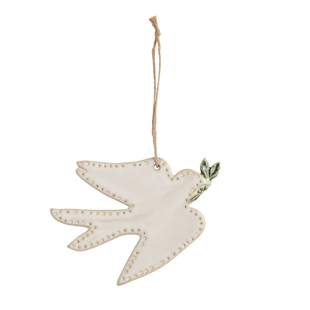 Ceramic Turtle Dove Ornament with dotted details, green leaf sprig, and twine loop.