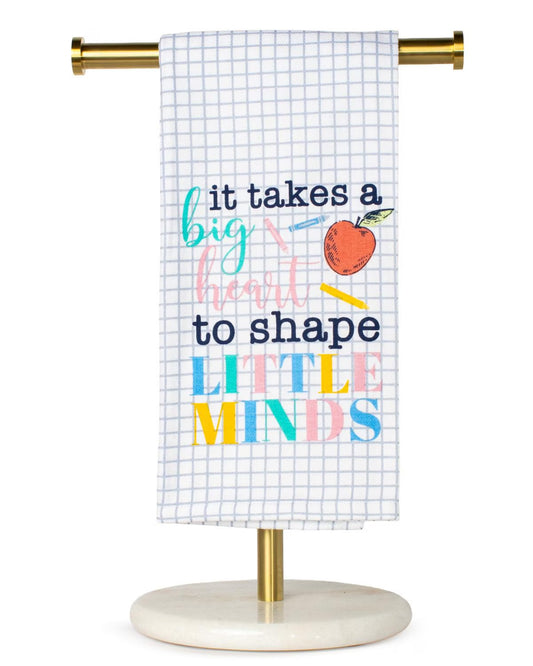 Blue grid hand towel with colorful "It takes a big heart to shape little minds" text and red apple. Sizes: 16"x28", 20"x40".