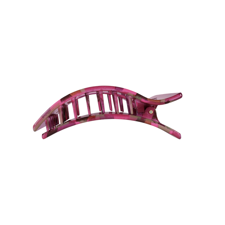 Pink, semi-transparent plastic hair clip with a curved shape and open slats; available in medium size.