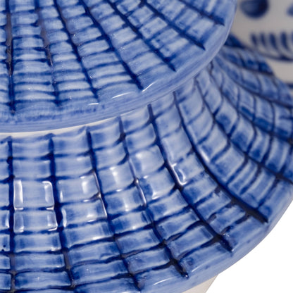 Blue Ceramic Plumeria Chinoiserie Pagoda Candle, 9 Oz, with blue and white glazed crisscross textured finish.