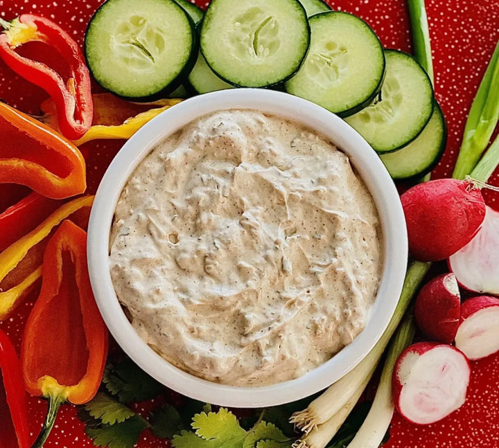 Carmie’s Dip Mix in a white bowl. Available sizes: 1 oz, 2 oz.