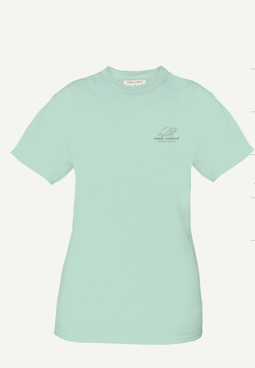 A light teal short sleeve BKNI-CHINCHILLA T-Shirt with a small logo on the left chest area, displaying a minimalist feather design and the text "single feather" in a cursive font. The shirt is displayed against a