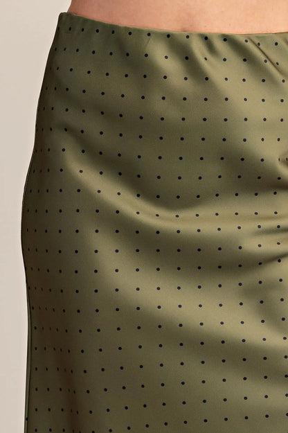 Green Polka Dot Satin Skirt with small navy dots, smooth shiny finish; available in sizes XS-XL.