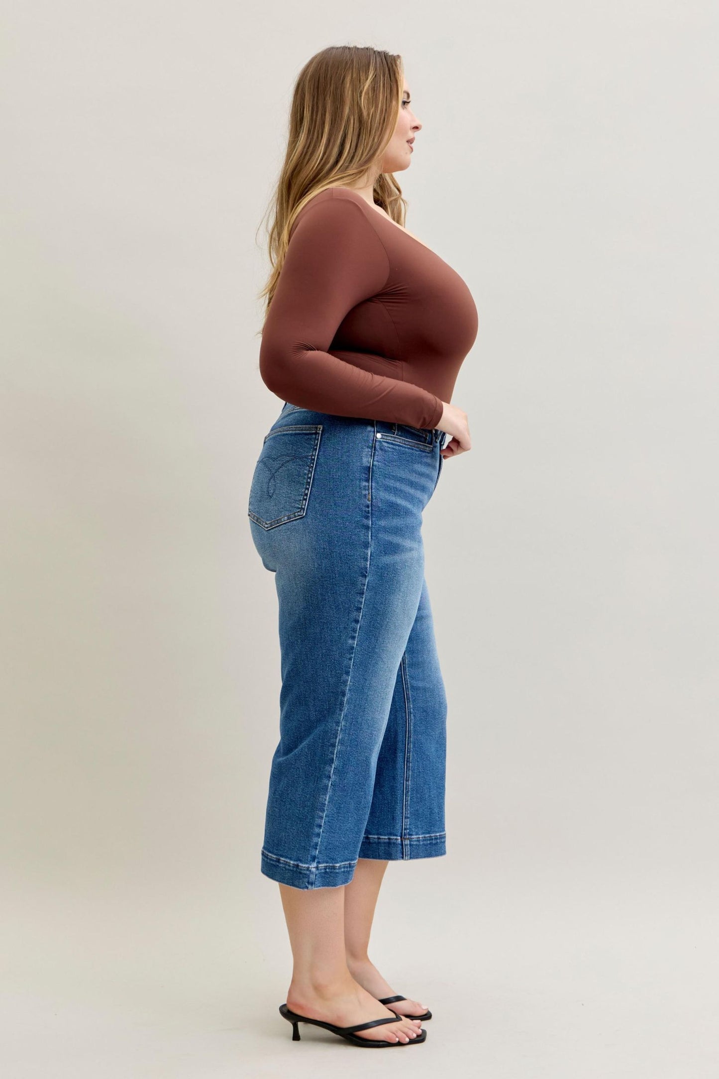 Judy Blue Capri Jeans available in sizes 0-20; classic blue wash, cropped length, slim fit.