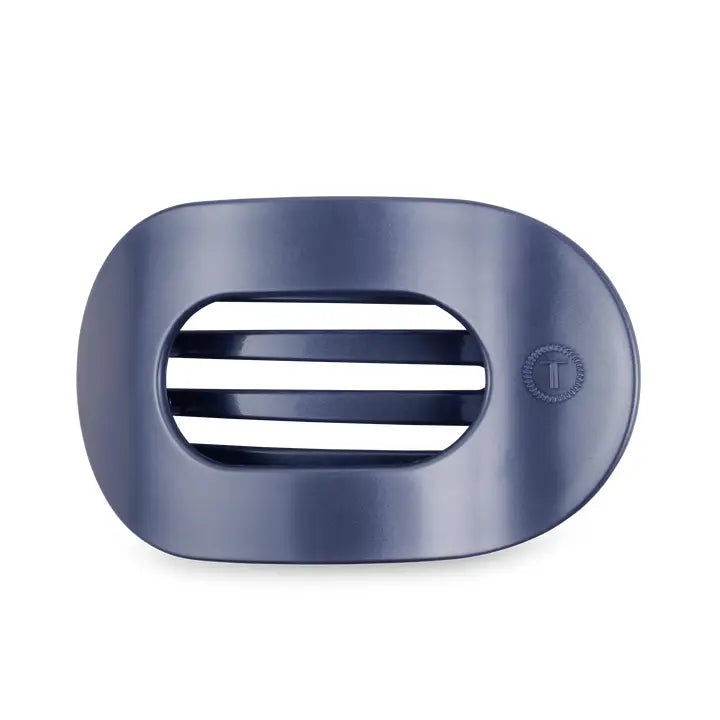 Dark blue oval TELETIES Flat Round Hair Clip with open slots, small circular logo on side. Available in multiple sizes.