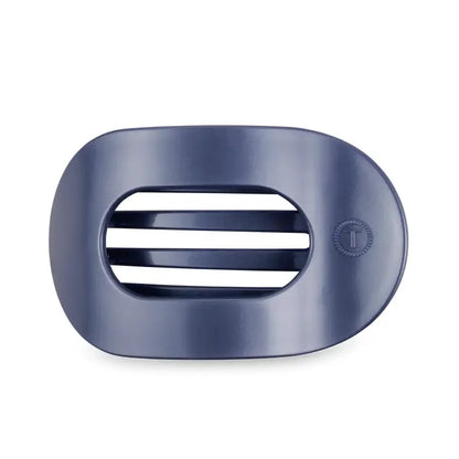 Dark blue oval TELETIES Flat Round Hair Clip with open slots, small circular logo on side. Available in multiple sizes.