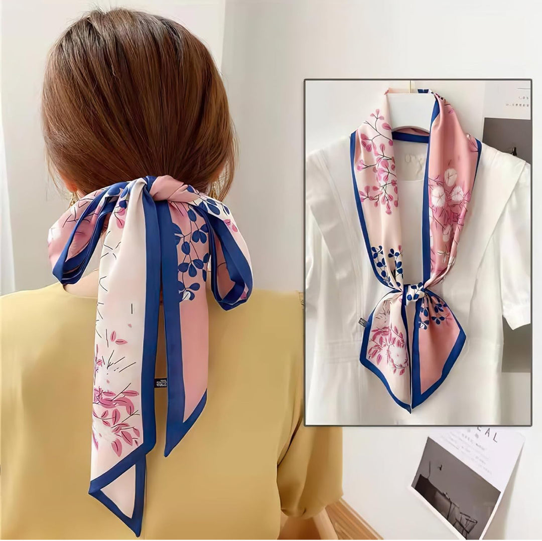 Silk Scarves pink floral satin scarf with blue edges, shown tied as a bow or around collar. Available in small and large sizes.