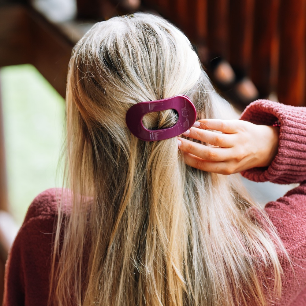 Mulberry Small Flat Round Hair Clip shown in use; available in small size.