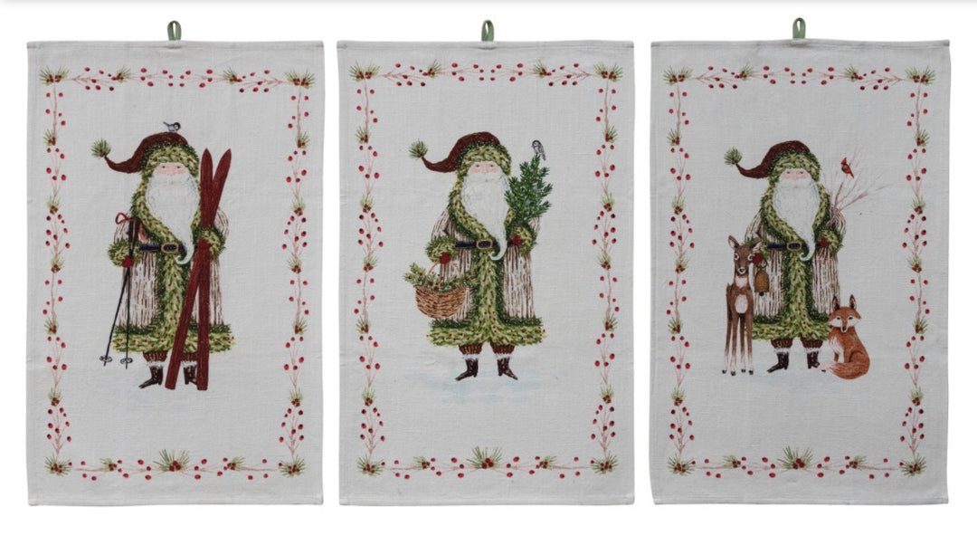 Three Santa &amp; Berries cotton printed tea towels featuring Santa Claus with red berries and pine needles.