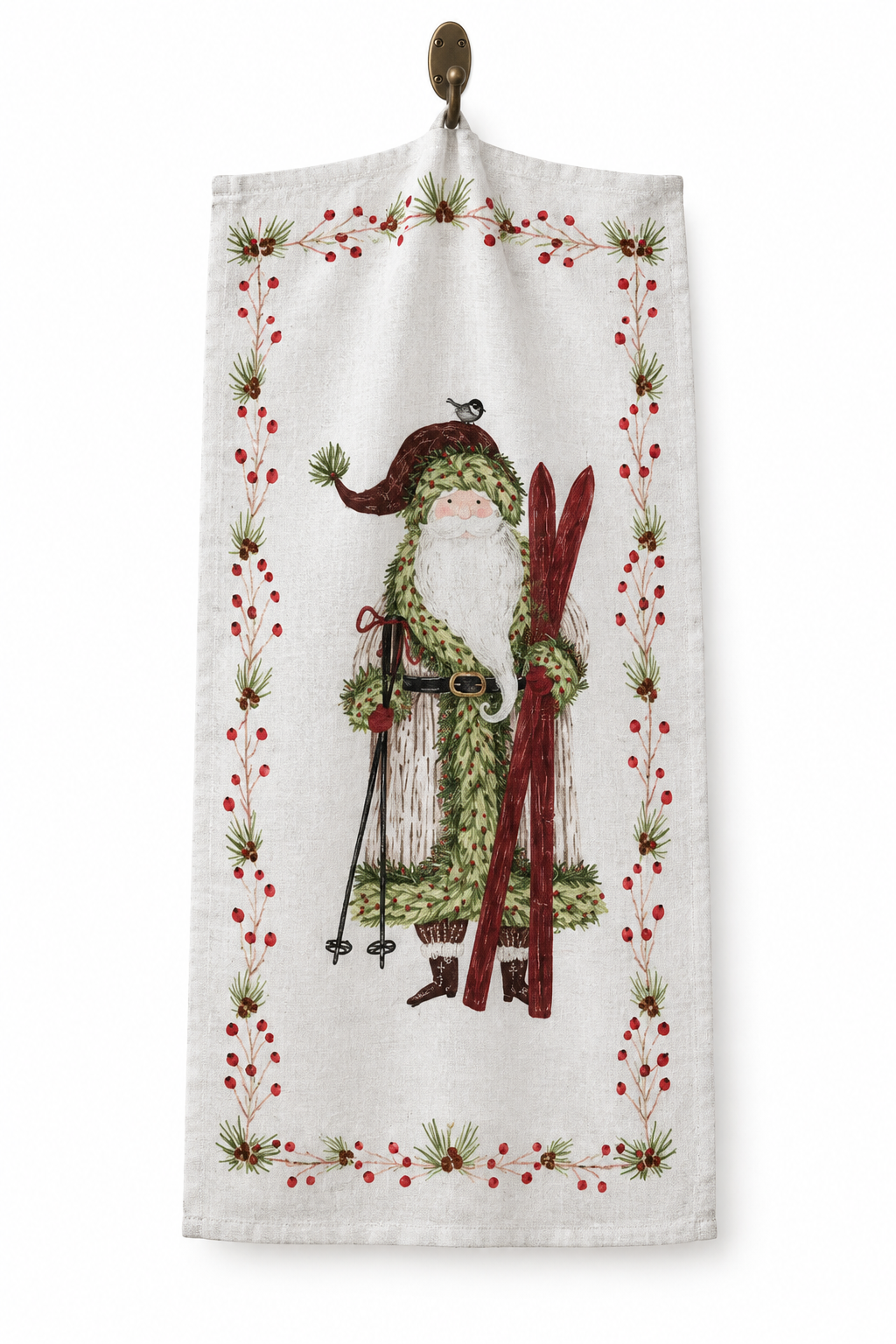 Cotton Printed Tea Towel with Santa &amp; Berries featuring Santa with skis and a border of pine needles and red berries.