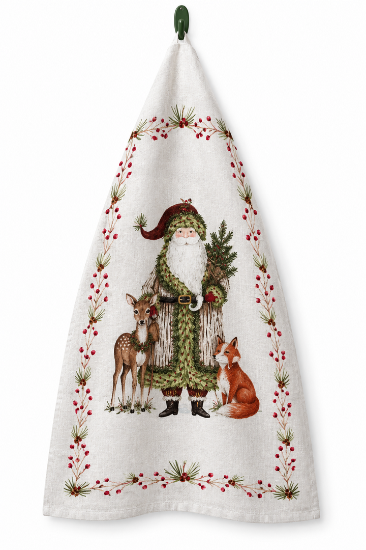 Cotton Printed Tea Towel with Santa, deer, and fox illustration and holly berry border.