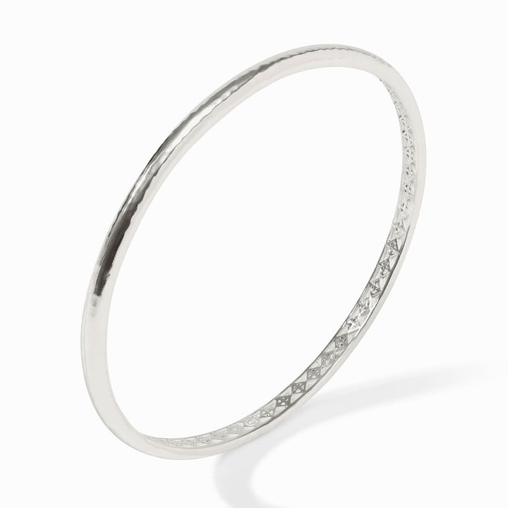 The Havana Demi Bangle Silver - M features a smooth outer surface and engraved inner design. Available in size M.