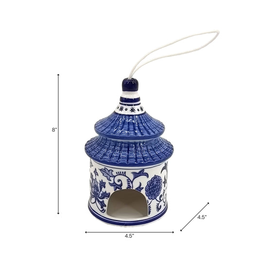 White/Blue 8x5 in. ceramic bird house with floral patterns, arched opening, and hanging string.