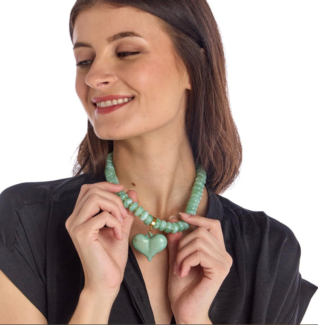 Happy Heart Beaded Necklace with a bold heart-shaped pendant and vivid green beads. Available in 16″ and 18″ lengths.