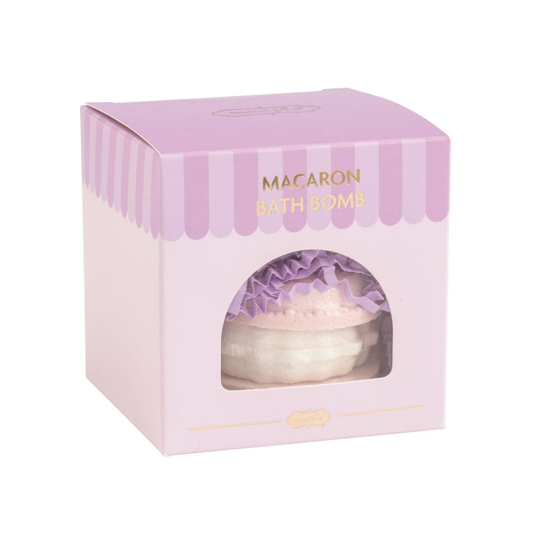 Macaron-shaped Café Bath Bomb in a purple and white striped window box.