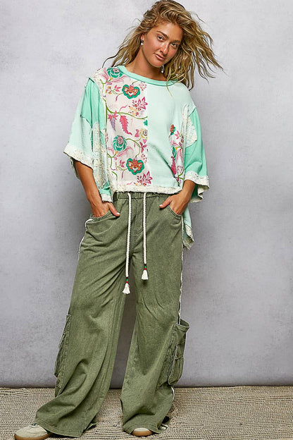 Oversized Round Neck Double Gauze Floral Woven Top. Available in sizes XS-XL.