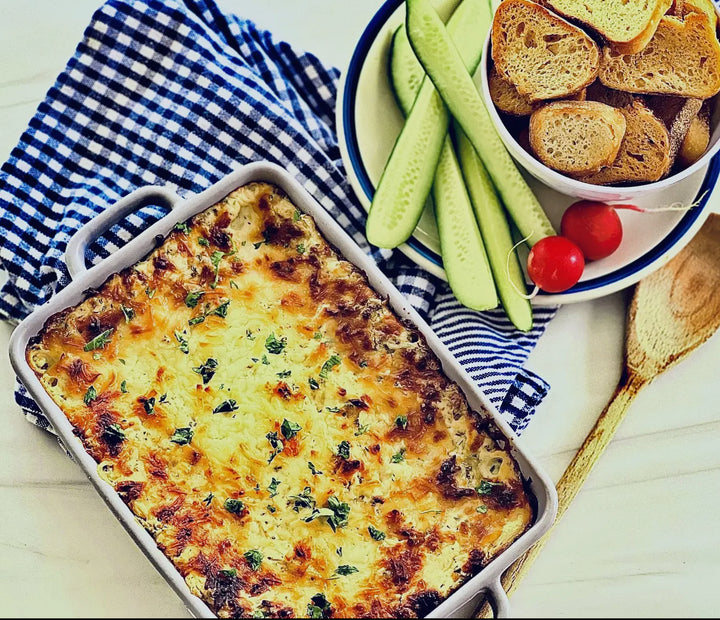 Cheesy Baked Spinach Artichoke Dip Mix casserole, available in 8 oz and 16 oz sizes.