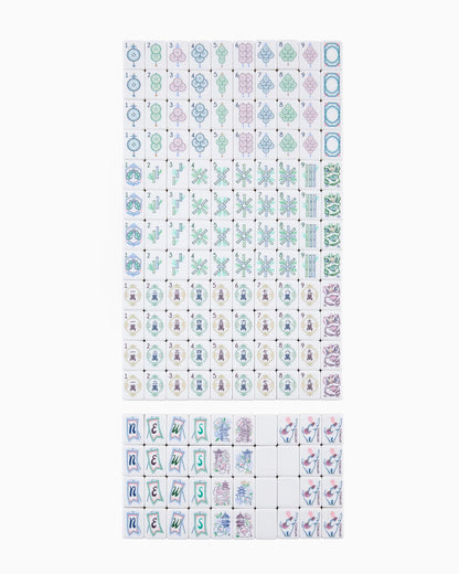 The Willow Mahjong Tiles set includes decorative tiles in circles, bamboo, characters, winds, dragons, flowers, and seasons with intricate designs and refined craftsmanship. Available in standard and large sizes.