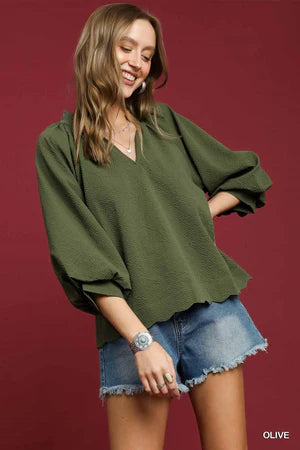 Scallop Hem Balloon Sleeve Top in olive green, available in sizes XS-XL. Features scalloped hem and balloon sleeves.
