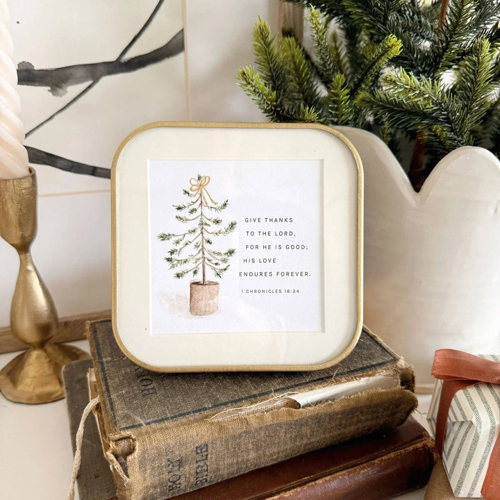 Framed print featuring a small Christmas tree and Bible verse. Available in 5x7 and 8x10 inches.