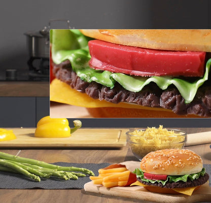Close-up of Faux Hamburger and Fries: cheeseburger with lettuce, tomato, and cheese. Sizes: small, medium, large.