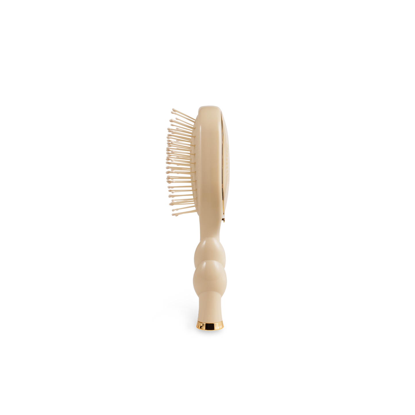 Mini Detangler Brush for Medium Hair in tan with gold-tipped handle. Available in mini size only.