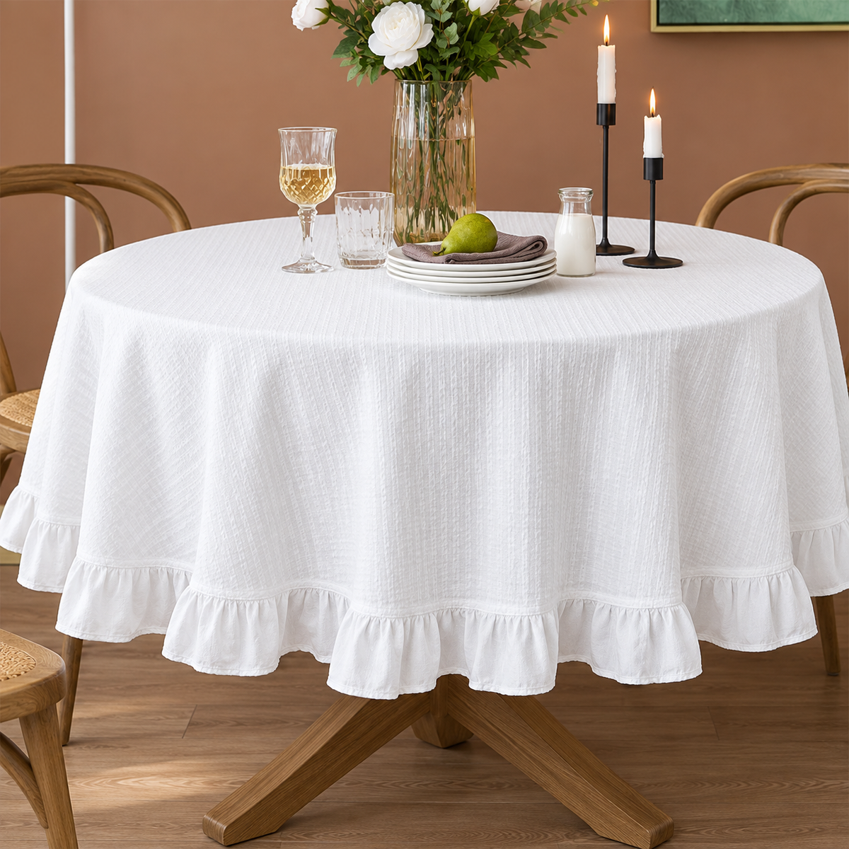 White French Ruffled Cotton Tablecloth in 55″x120″ rectangular size on a table.