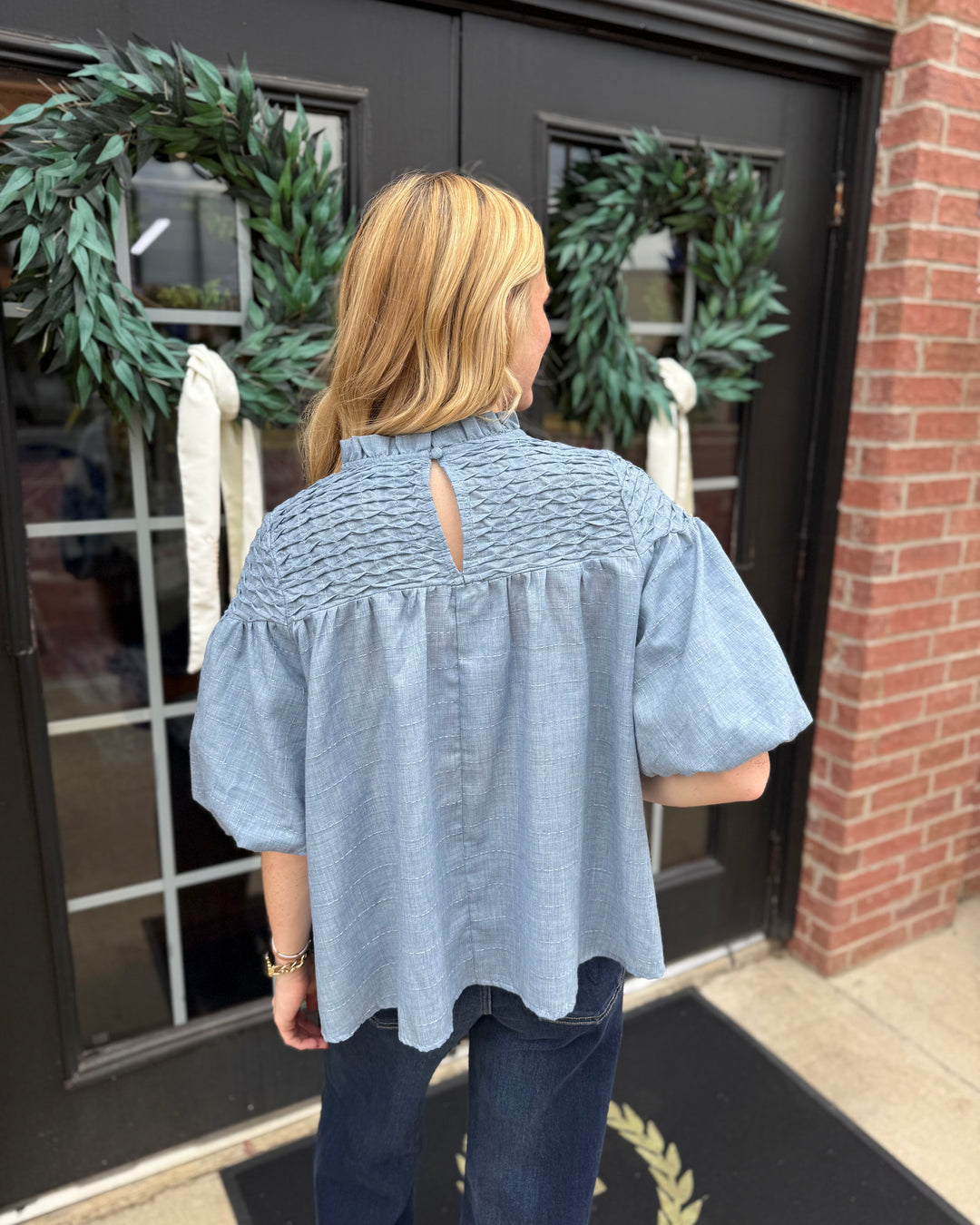 Bubble Sleeve Blouse in light blue, available in sizes XS-XL.