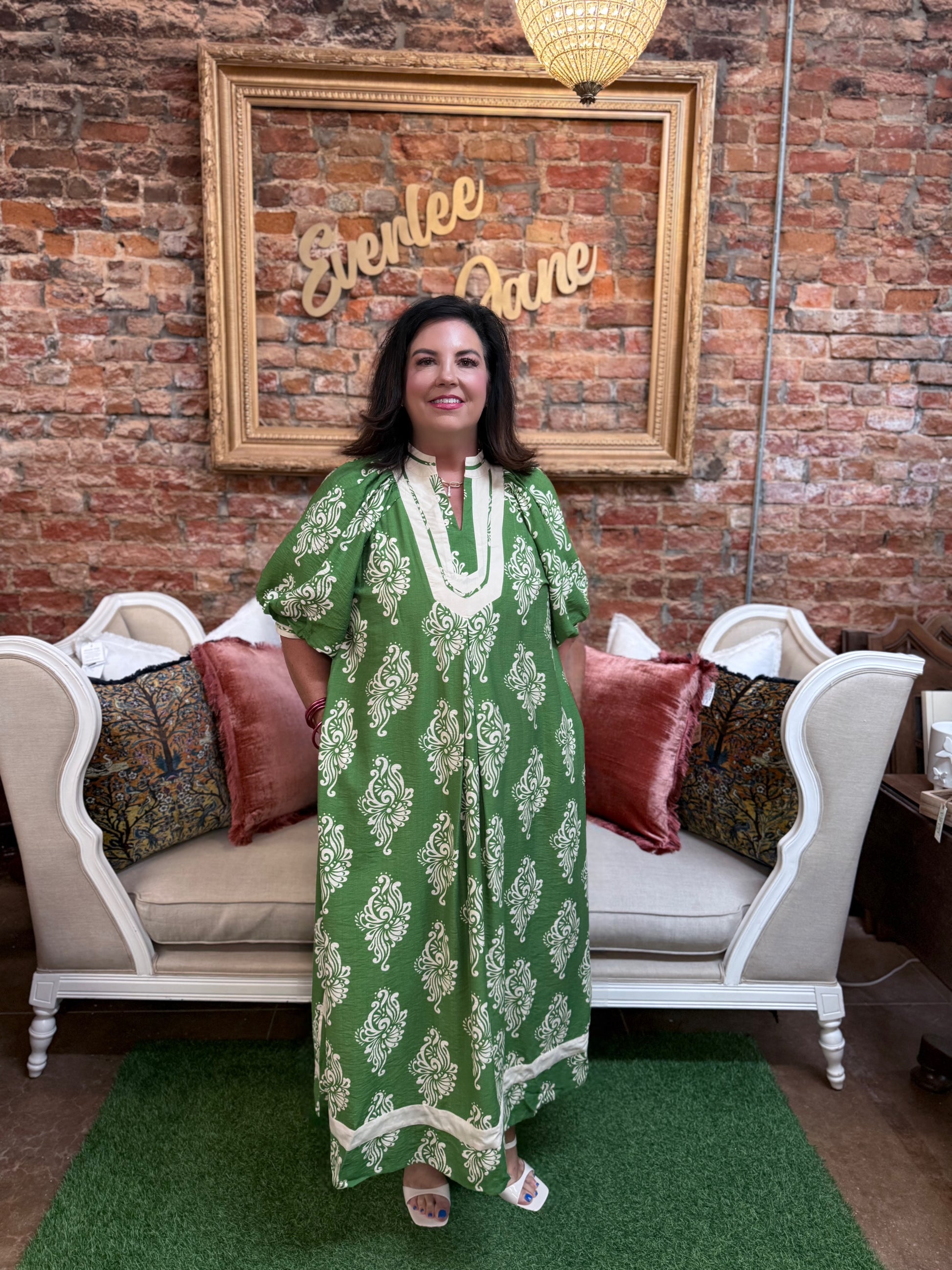 Green Abstract Print Midi Dress with flowy silhouette, V-neckline, and puff sleeves. Available in sizes XS-XL.