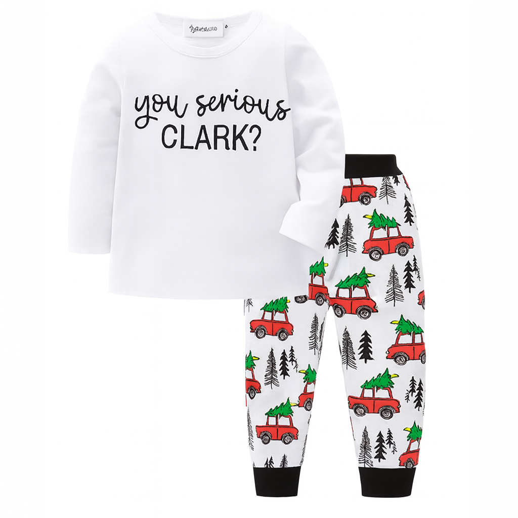 You Serious Clark? Cotton 2-Piece Boy Clothes Set in size 3-4T includes a white cotton long sleeve top with “You serious CLARK?” and pajama pants decorated with red trucks carrying Christmas trees and black tree accents.