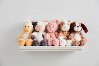 Set of five farm plush animals—duck, cow, pig, horse, and dog—in soft faux fur. Available in small and medium sizes.